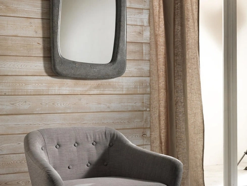 Specchio Smooth con rivestimento della cornice in tessere di pietra fossile di Stones