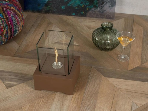 Biocamino da tavolo Alphaville con struttura in magnesia e vetro temperato di Stones