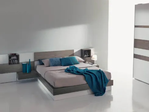 Letto in legno e laccato con testiera a boiserie modulare e contenitore Plan di Fimar