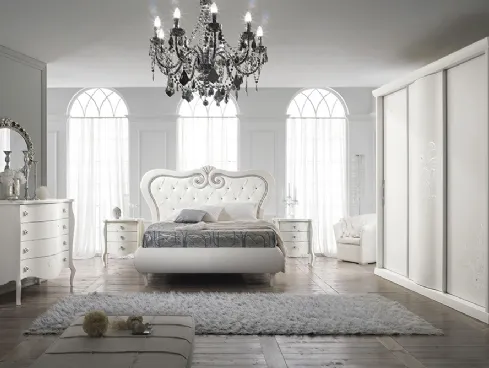 Letto in legno laccato bianco e pelle lavorazione capitonneé Flora di Mobilificio AG