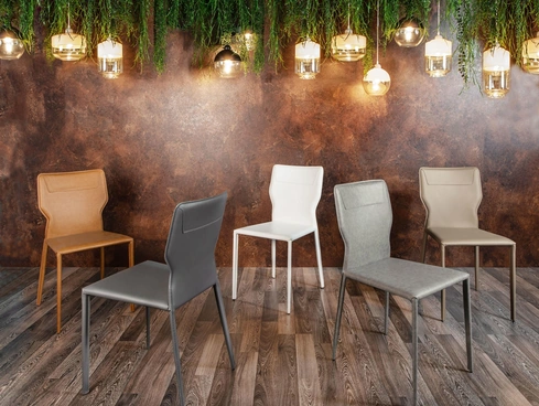 Sedia Kim rivestita in similcuoio vari colori di Stones